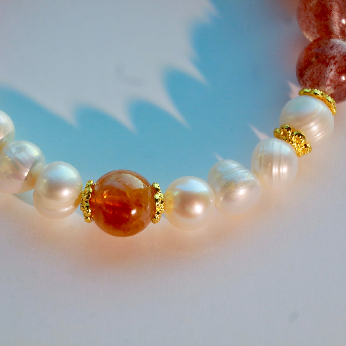 10mm Strawberry Quartz & Pearl Bracelet with Golden Rutilated Quartz